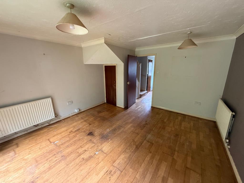 Lot: 131 - HOUSE FOR IMPROVEMENT - Living room looking towards the front of the house